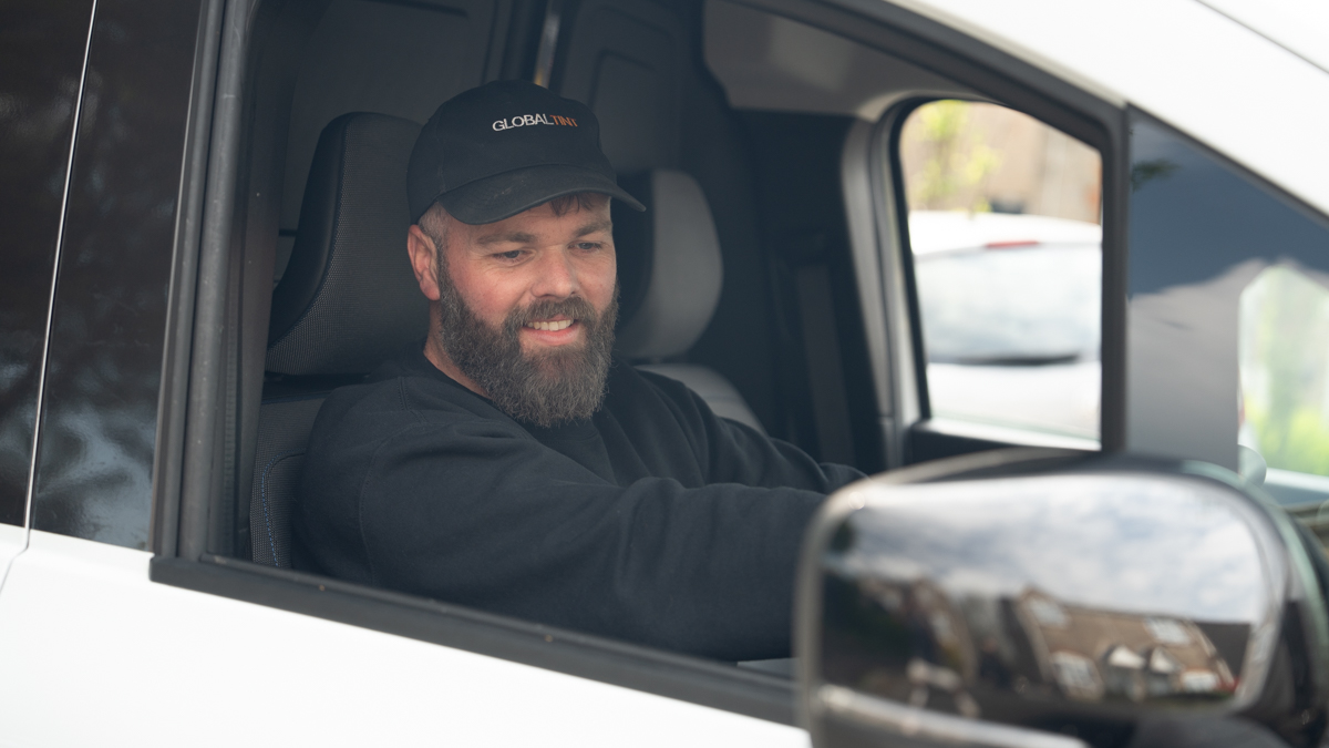 A Global Tint installer at work
