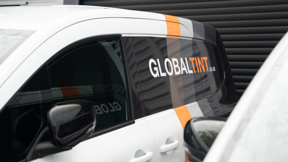 A Global Tint installer at work