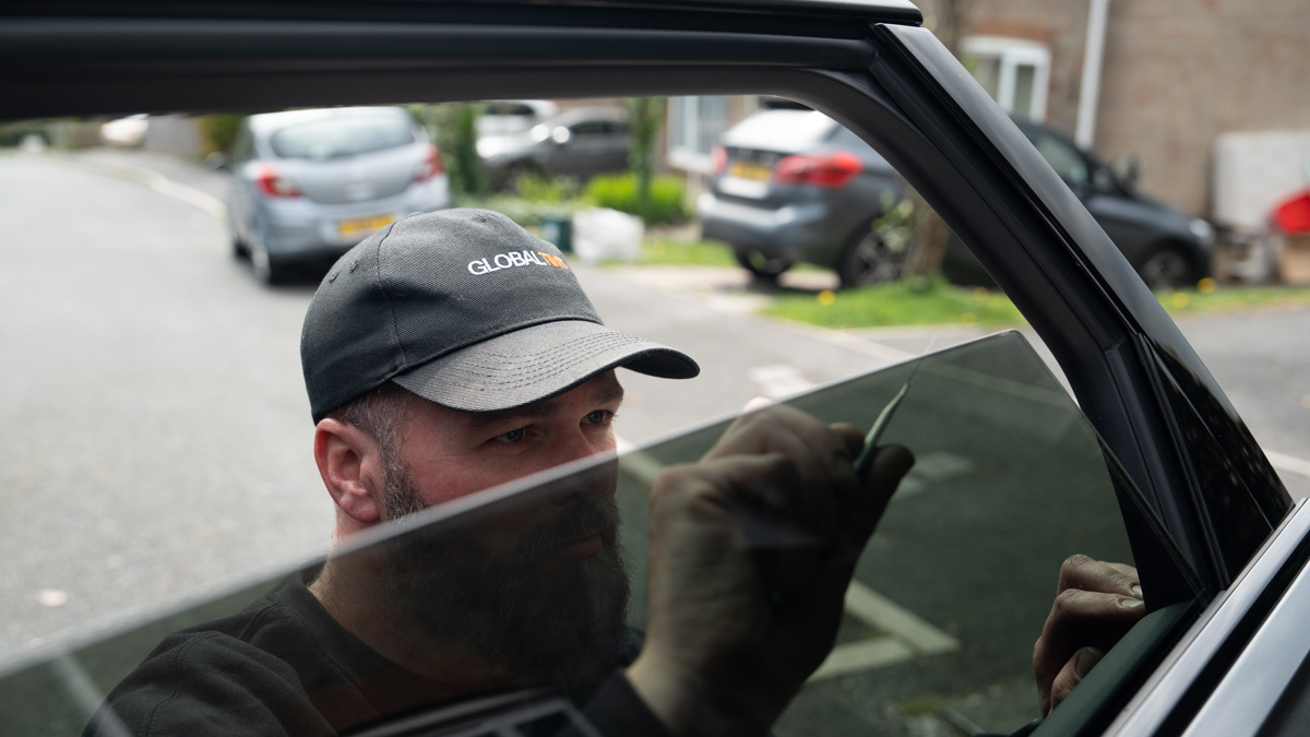 A Global Tint installer at work