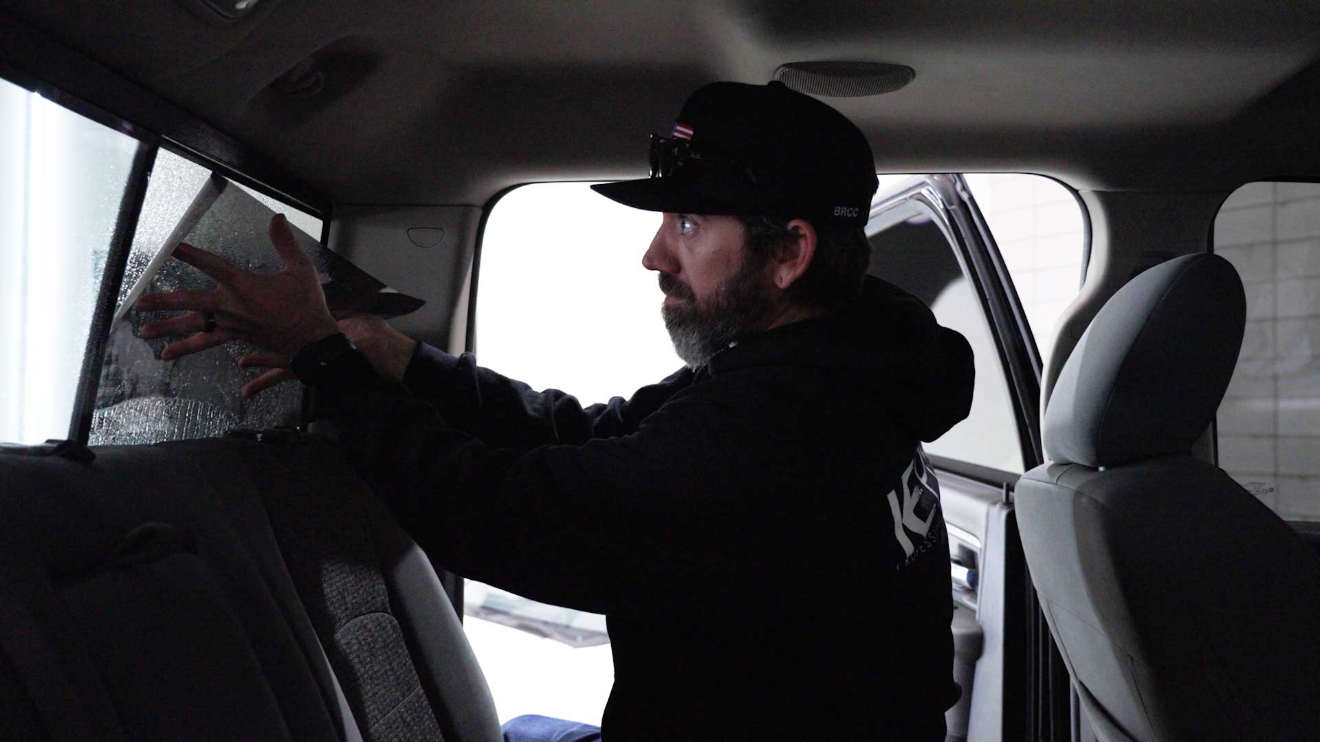 A Global Tint installer at work