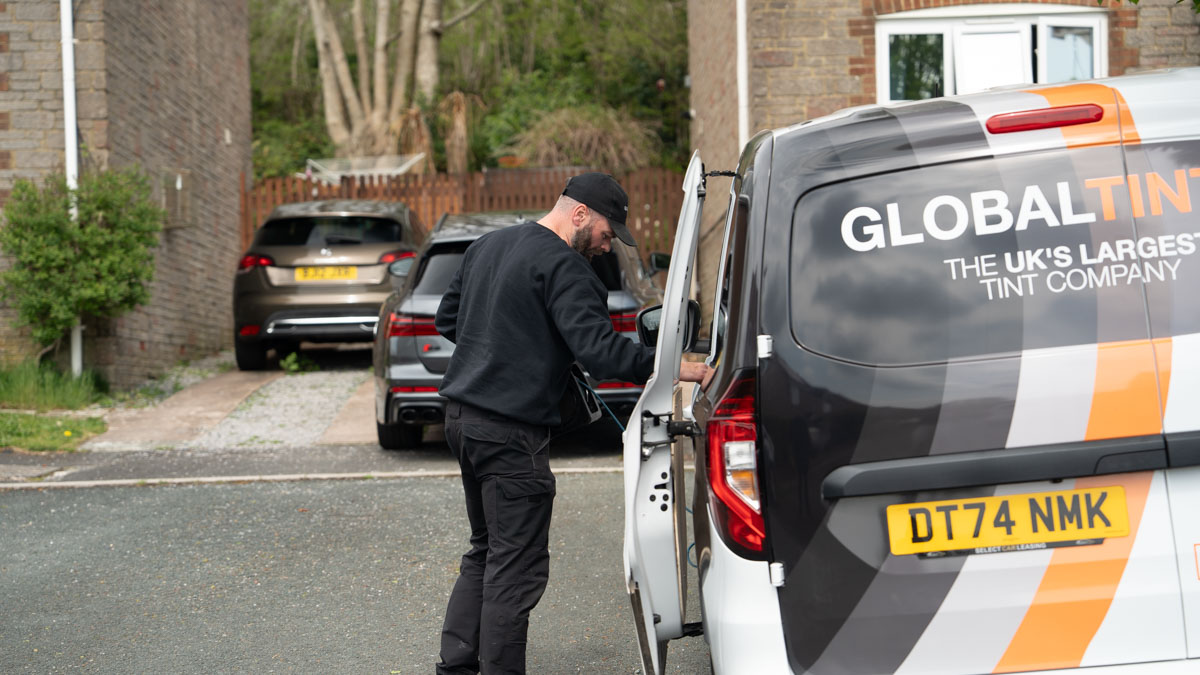 A Global Tint installer at work
