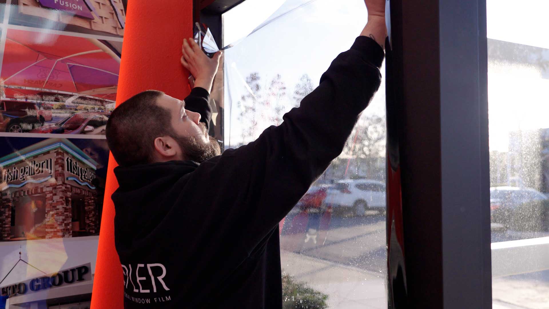 A Global Tint installer at work